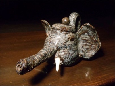 A teapot sculpted as an elephant